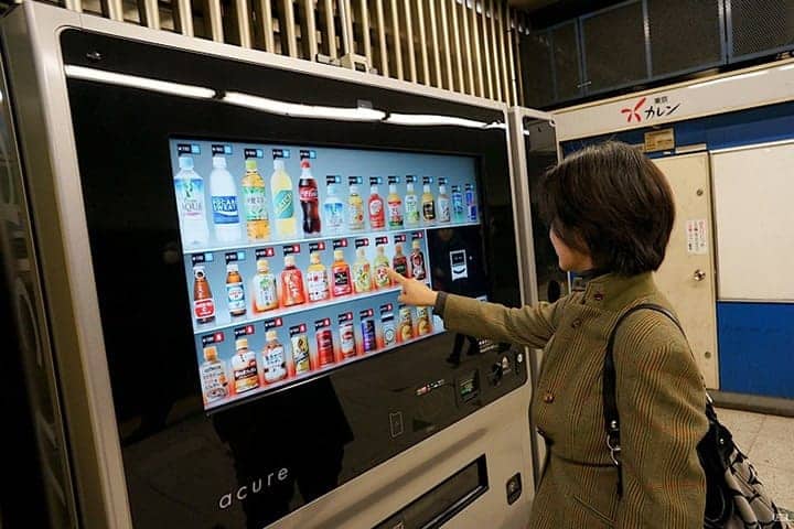 Woman at vending machine